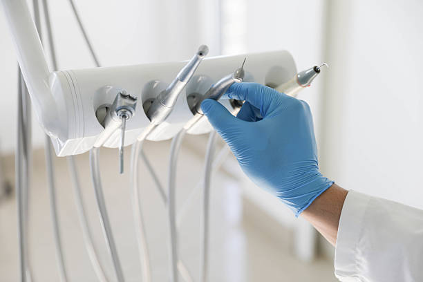 Professional Tooth Extraction technician working in Breckenridge, MI